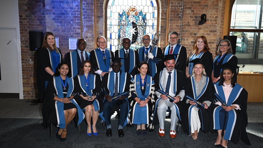 TEF winners receiving their awards at the Membership Ceremony